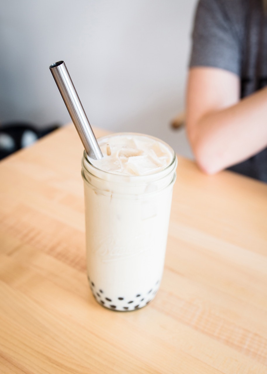 Mason jar with reusable straw at Tea Bar PDX by Candace Molatore​ for Conscious by Chloé
